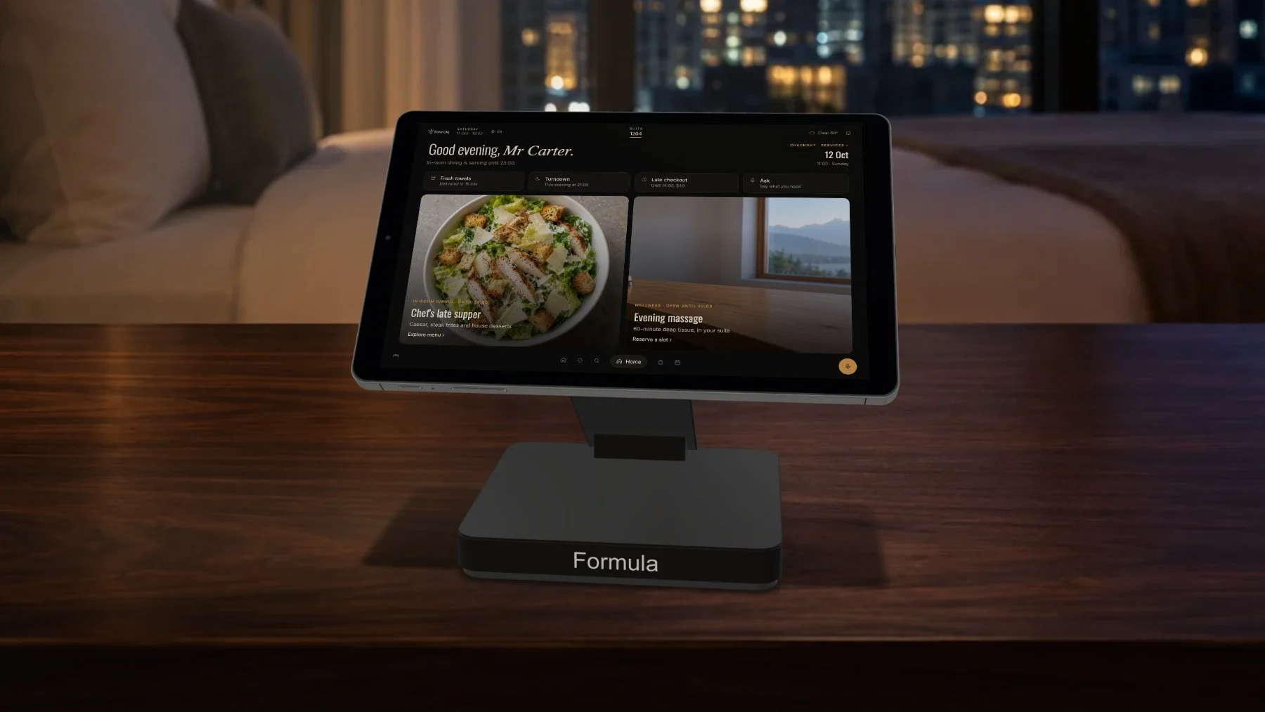 Formula on a hotel bedside table, showing a hotel app with in-room dining, housekeeping and wellness